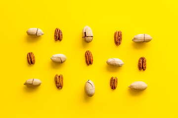 Pecan nuts pattern. Food background, top view
