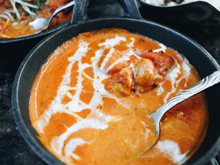Butter chicken (murgh makhani), famous food in North India. Made from buttery gravy with cream like curry sauce.  