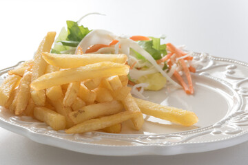 Tasteful roasted turkey steak with chips and vegetable