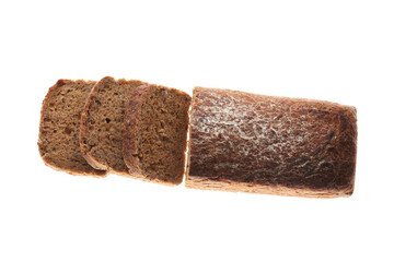 Cut freshly baked bread isolated on white, top view