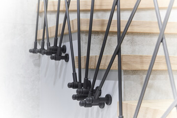 modern designer handmade stairs with metal black railings