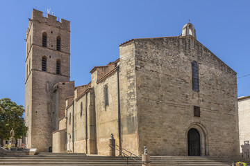 Fototapeta na wymiar Church Notre-Dame del Prat (1178) in Argeles-sur-Mer. In XIV century Notre-Dame rebuilt and equipped with a beautiful bell tower. Argeles-sur-Mer, Pyrenees Orientales, Languedoc Roussillon, France.
