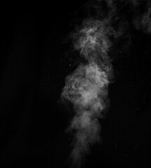 White smoke on black background. Figured smoke on a dark background. Abstract background, design element