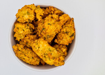 Fried rice balls in bowl, top view. Fried rice balls aka bolinho de arroz in Brazil.