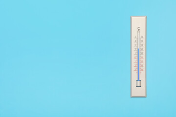Weather thermometer on light background, top view. Space for text