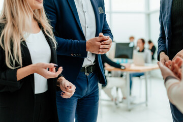 business couple talking about something standing in the office