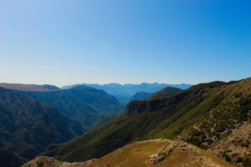 Many mountain peaks and hills observed above the old Bosnian village of Lukomir. Mountain peaks and hills.