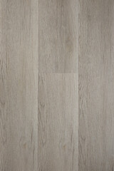 Obraz premium Hardwood laminate floor viewed from above for natural texture and background. 