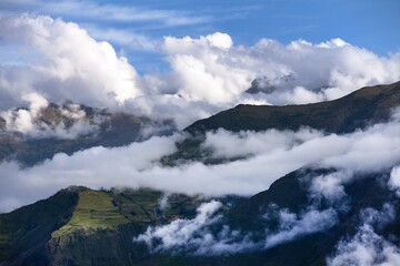 Village and terraced field in the middle of clouds peru