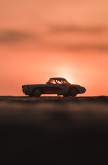 Fototapeta na wymiar car on the road in the sunset