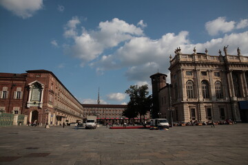 Obraz premium View of city square Piazza Castello and Madama Palace under blue sky in Turin, Italy