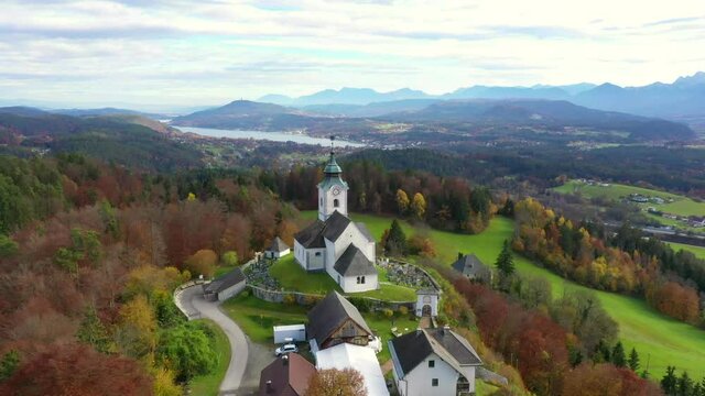 Sternberg church and idyllic graveyard in Wernberg, Carinthia, Austria during autumn.