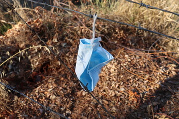 
The surgical mask worn for covid-19 precautionary purposes is in nature, carelessly thrown around,