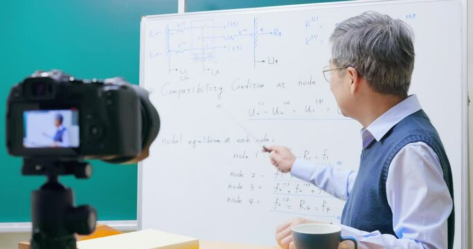 male professor teaching online