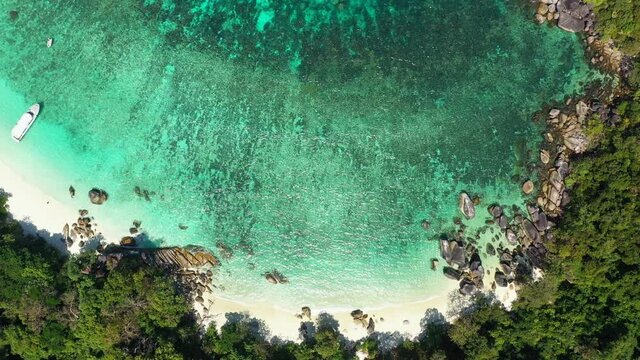 Footage B-roll of myanmar island beach ocean waves, Beautiful tropical beach and rocky coastline and beautiful forest. Nyaung Oo Phee Island Myanmar. Tropical seas and islands in southern Myanmar