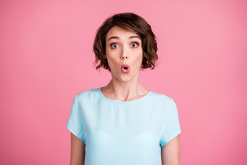 Photo of impressed funny lady dressed casual blue t-shirt made lips pouted isolated pastel pink color background