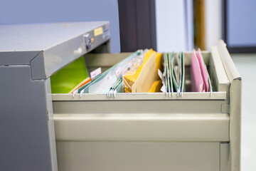 file folder documents In a file cabinet retention concept business office equipment