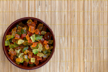 brown pot with candied fruit. top view