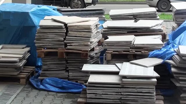 a bunch of building materials covered with rain