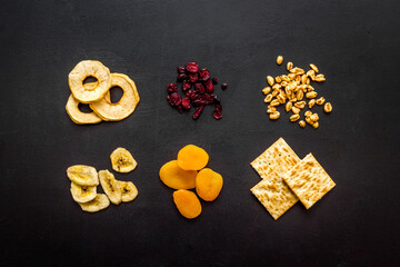 Pattern of snacks mix top view - nuts and dried fruits