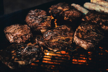 Grilled pork steak with rosemary sprigs