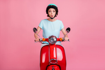 Close up photo of surprised pretty positive girl ride red moped fast wear blue t-shirt slam...