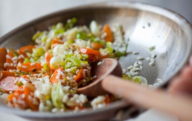 Close up of risotto with spring carrots and leeks