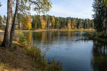 Autumn landscape with a pond in the city of Kokhma, Ivanovo region.