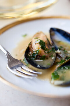 Ale steamed mussels with garlic and mustard on plate