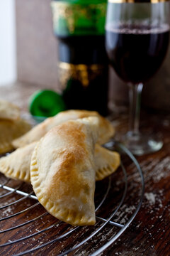 Close up of traditional empanadas with wine