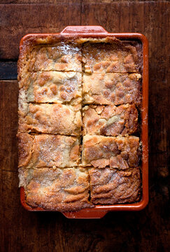 Overhead view of Saint Louis gooey butter cake on baking pan