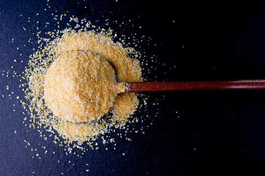 Close up of dry polenta on spoon