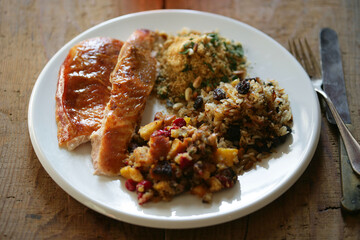 Close up of meal with Thanksgiving turkey and side dishes