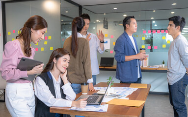 The Asian Employee Brainstorming business Meeting in the Office. Startup of the partnership, Discussion of planning the roles of staff in the corporate.