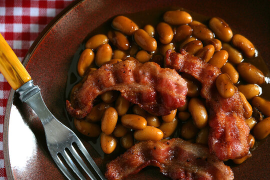 Overhead View Of Meal Of Bacon And Beans On Plate