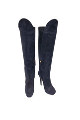 Women's leather boots on a white background.