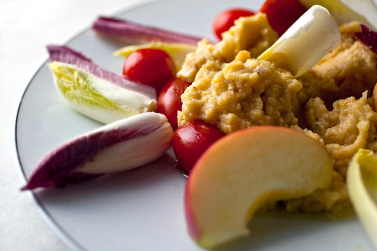 Close up of chicory, apple and split pea puree dish