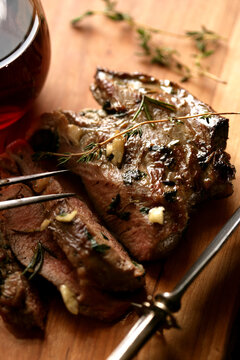 Close up of grilled pork meat on cutting board