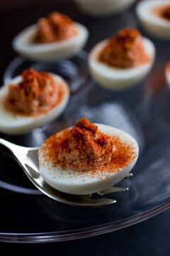 Close up of smoky red devil eggs