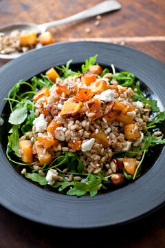 Close up of ferro salad with rutabaga, ricotta and hazelnuts