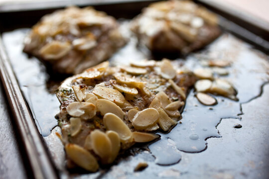Close up of blue fish with almonds