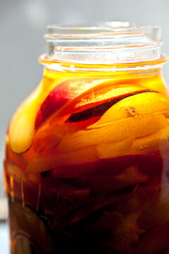 Close up of traditional rumtopf in jar