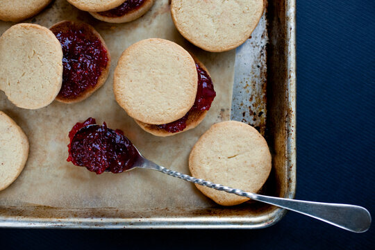 Close up of sandwich cookies with jam