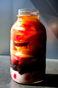 Close up of traditional rumtopf in jar