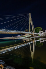 Fototapeta na wymiar Puente moderno sobre un río en la ciudad de Fuengirola, Málaga.