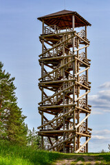Fototapeta na wymiar A six-storey observation tower on the river bank