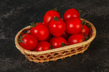 Ripe juicy cherry tomato in the bowl