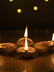 Clay Diya  or lamp with rangoli  stock image.