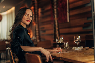 beautiful woman sitting in the restaurant