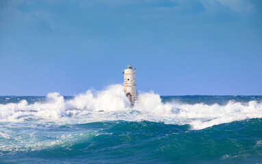 Lighthouse sea waves rain storm
